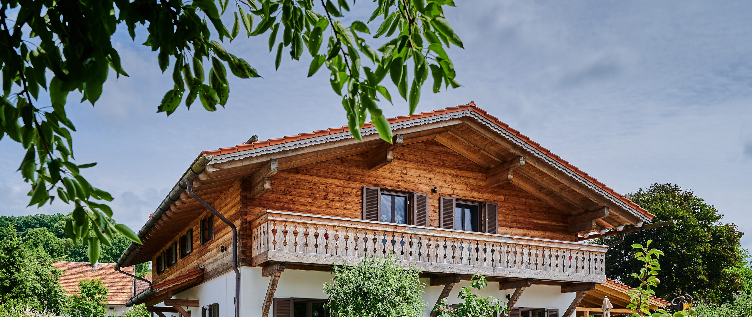 Massivholzhaus St_W im Blockhaus-Stil